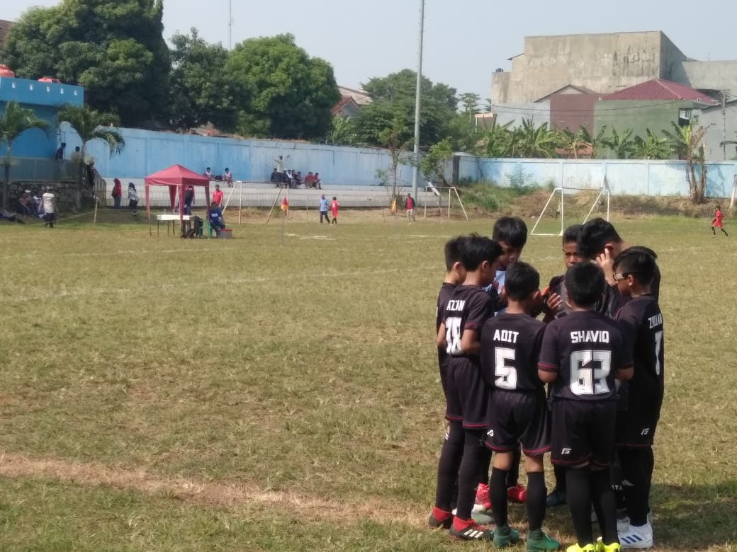 ampak Tim sepak bola U-12 yang mengikuti Kompetisi liga Aqua Danone Nations Cup (DNC) di Stadion Mini Ciputat, Jalan Pendidikan, Ciputat, Tangsel, Sabtu (22/6/2019).