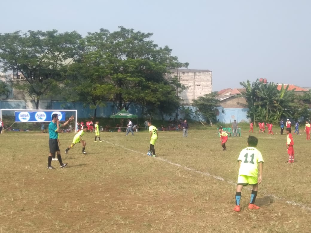 Tampak Tim sepak bola U-12 yang mengikuti Kompetisi liga Aqua Danone Nations Cup (DNC) di Stadion Mini Ciputat, Jalan Pendidikan, Ciputat, Tangsel, Sabtu (22/6/2019).
