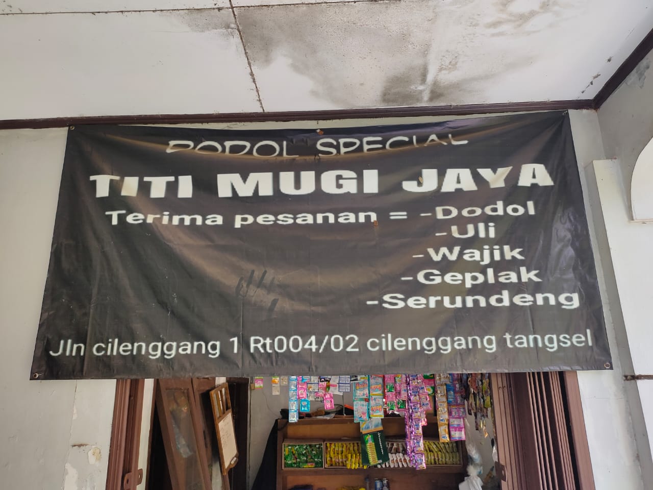 Spanduk Titi Mugi Jaya.