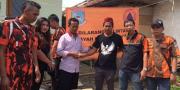 Ormas Pemuda Pancasila Baksos ke Korban Longsor Setu