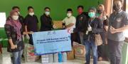 Jelang HUT, WOM Finance Salurkan Bantuan di Zona Merah COVID-19 Tangerang
