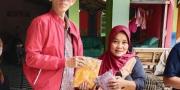 Bulan Maulid, Anggota DPRD Tangerang Bagikan 1.000 Kerudung